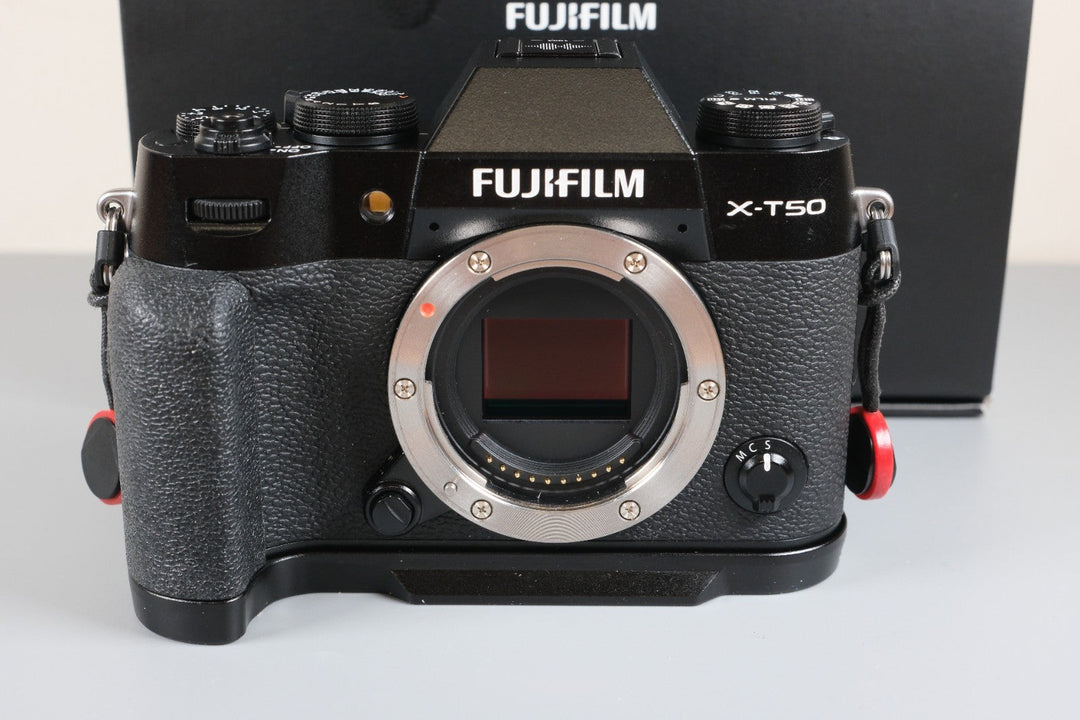 Fujifilm X-T50 Mirrorless Camera with Extras (Grip, Wrist Strap, and Flash)