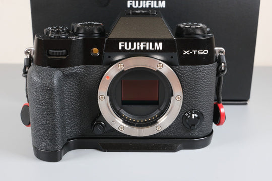 Fujifilm X-T50 Mirrorless Camera with Extras (Grip, Wrist Strap, and Flash)