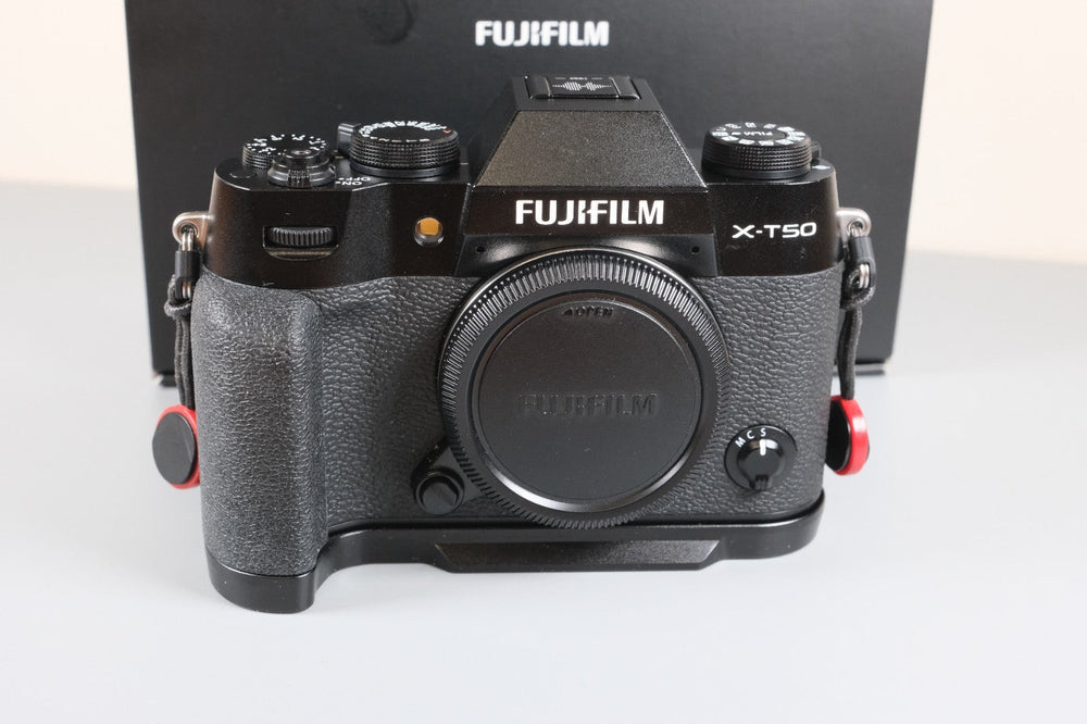 Fujifilm X-T50 Mirrorless Camera with Extras (Grip, Wrist Strap, and Flash)